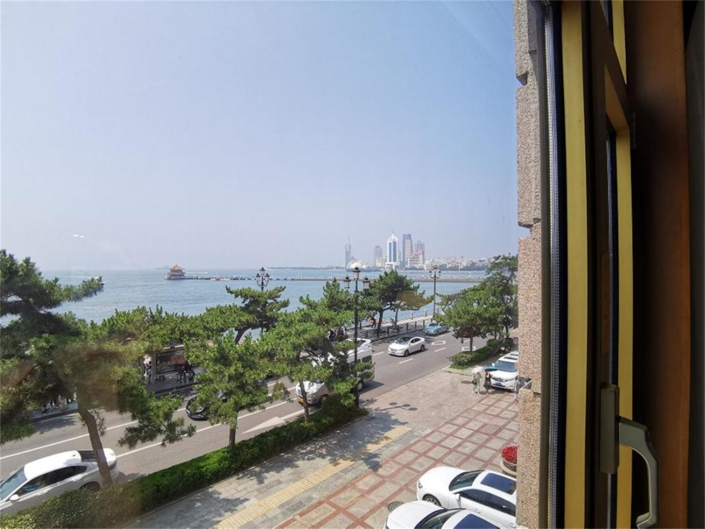 Qingdao Oceanwide Elite Hotel Exteriör bild